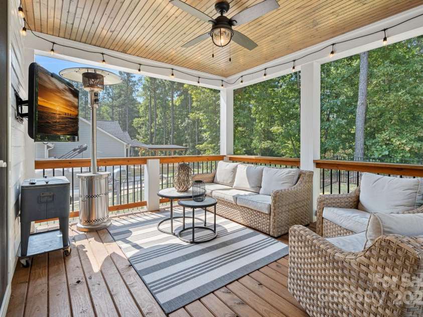 4195 Island Fox Lane, Denver, NC 28037.  MLS# CAR4243299, YatesRealty ID 10051. Enjoy outdoor living year round on screened in back porch.