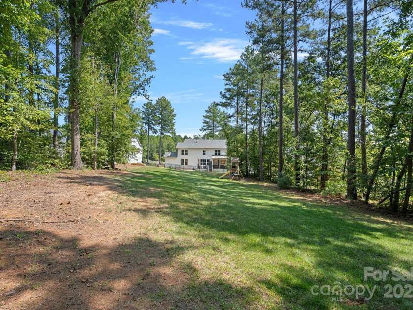 4195 Island Fox Lane, Denver, NC 28037.  MLS# CAR4243299, YatesRealty ID 10051. Nestled on .78 acres for you to escape and enjoy!