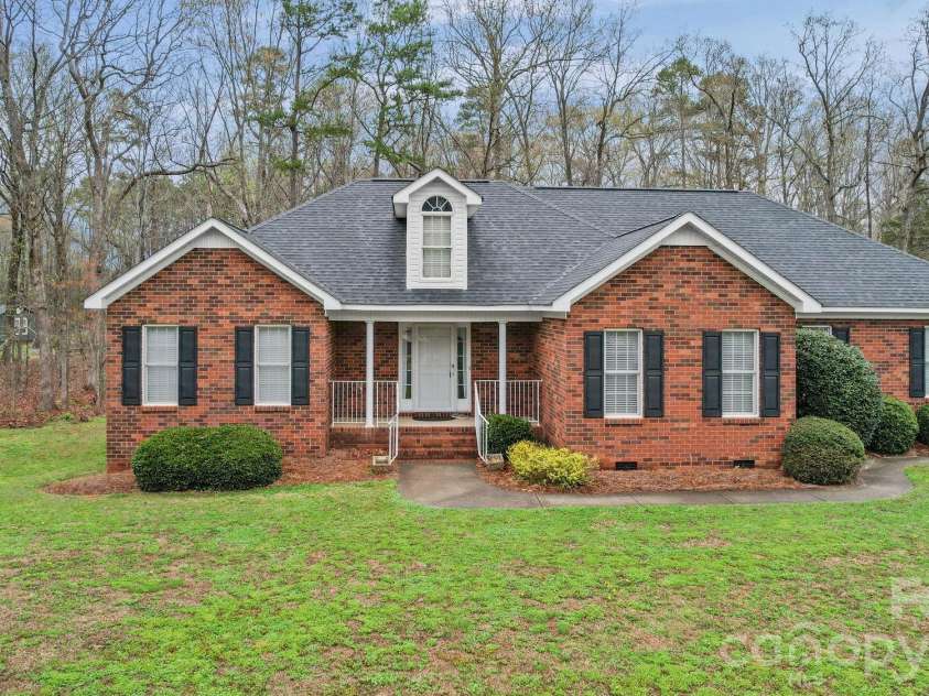 410 Elm Street, Wingate, NC 28174.  MLS# CAR4355431, YatesRealty ID 10052. 