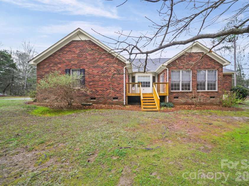 410 Elm Street, Wingate, NC 28174.  MLS# CAR4355431, YatesRealty ID 10052. 