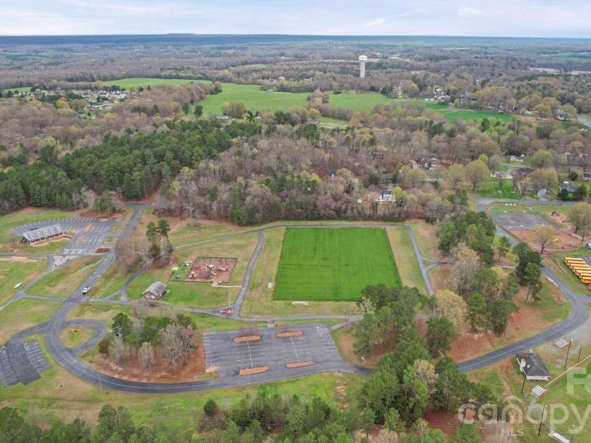 410 Elm Street, Wingate, NC 28174.  MLS# CAR4355431, YatesRealty ID 10052. 