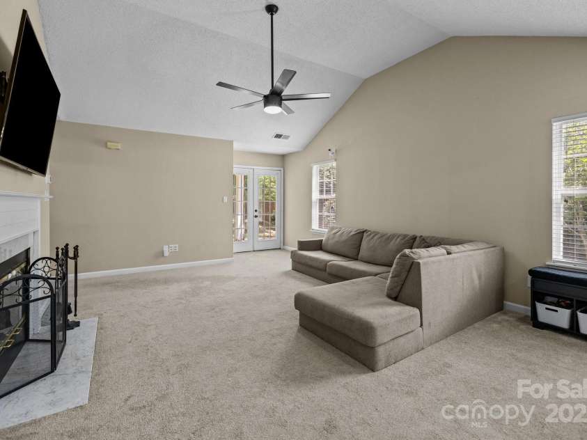 16117 Wrights Ferry Road, Charlotte, NC 28278.  MLS# CAR4251187, YatesRealty ID 10054. Living room leads to rear yard