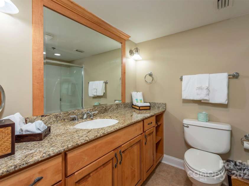 303 Bowling Park Road, Asheville, NC 28803.  MLS# CAR4202731, YatesRealty ID 10057. Guest full bath.