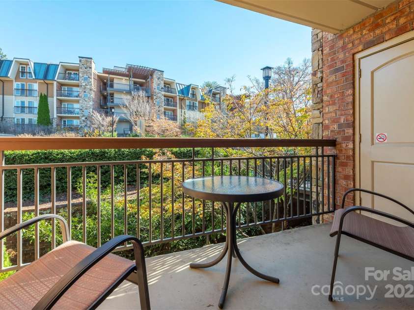 303 Bowling Park Road, Asheville, NC 28803.  MLS# CAR4202731, YatesRealty ID 10057. Private balcony to enjoy the seasons.