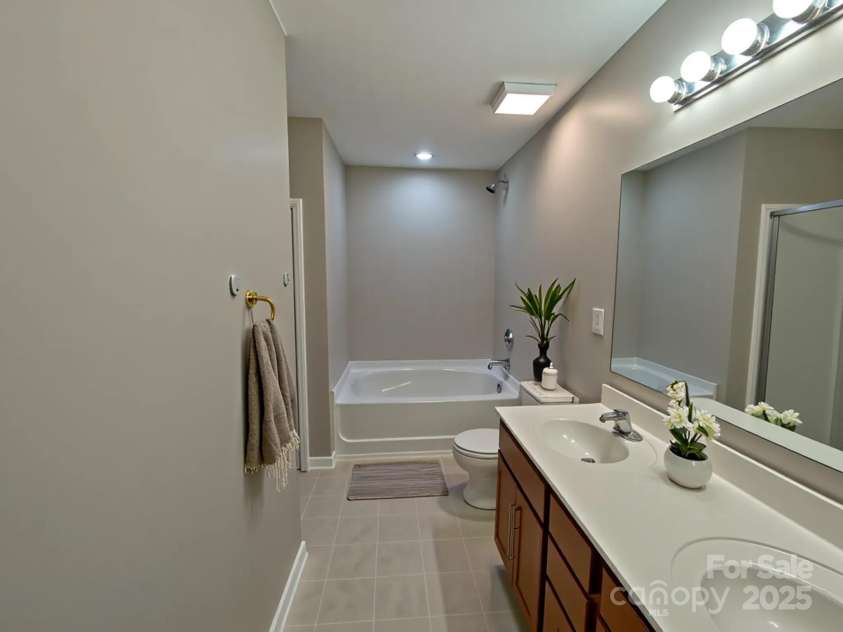 8644 Old Potters Road, Charlotte, NC 28269.  MLS# CAR4290661, YatesRealty ID 1006. Master Bath Virtually Staged