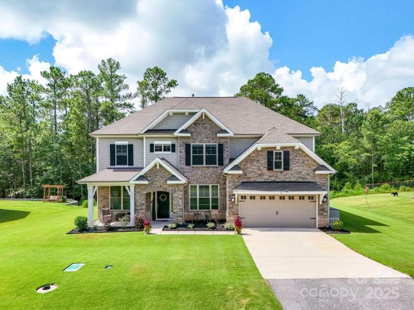 5057 Spratt Road, York, SC 29745.  MLS# CAR4299450, YatesRealty ID 10064. Well manicured yard with beautiful curb appeal