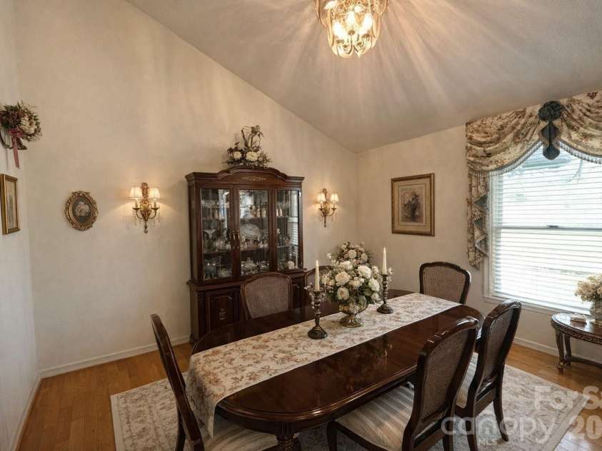 3558 Playmore Beach Road, Lenoir, NC 28645.  MLS# CAR4367215, YatesRealty ID 10067. Dining area with A-I altered decor