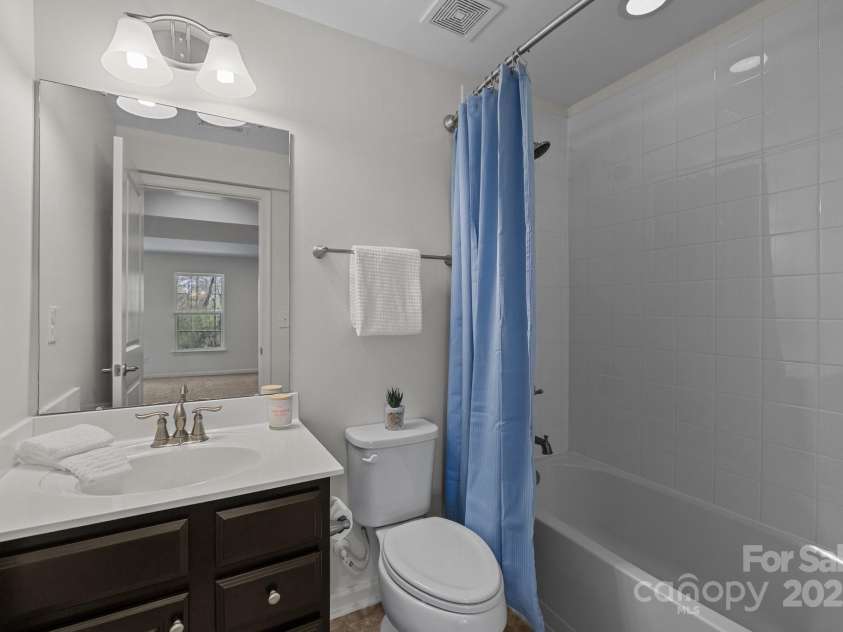 6004 Clover Hill Road, Indian Trail, NC 28079.  MLS# CAR4238605, YatesRealty ID 10068. Downstairs full bathroom