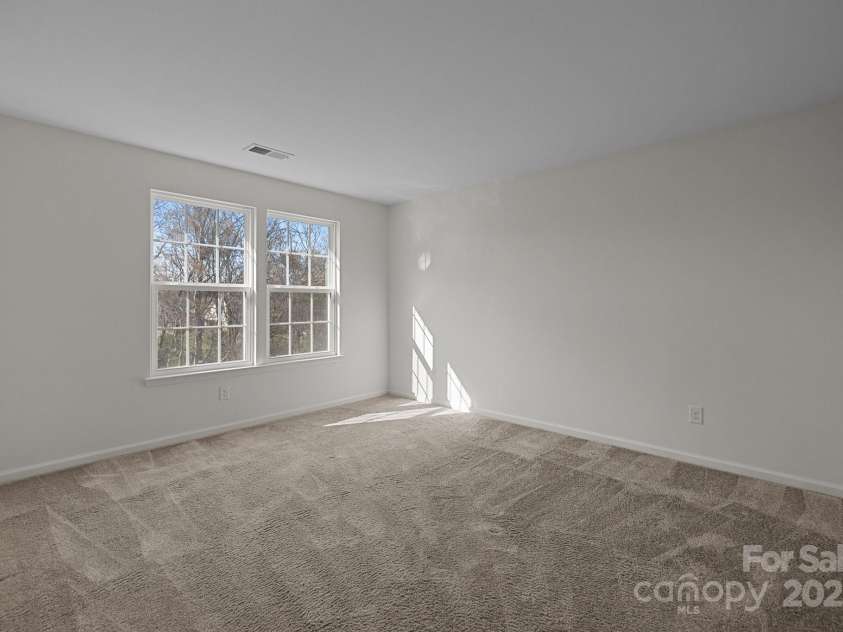 6004 Clover Hill Road, Indian Trail, NC 28079.  MLS# CAR4238605, YatesRealty ID 10068. Upstairs Guest Bedroom