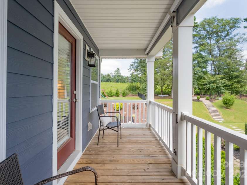 1180 Weir Court, Fort Mill, SC 29708.  MLS# CAR4173538, YatesRealty ID 1007. Covered Porch off the Primary Bedroom