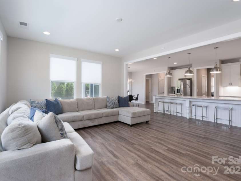 1180 Weir Court, Fort Mill, SC 29708.  MLS# CAR4173538, YatesRealty ID 1007. Family Room to Kitchen