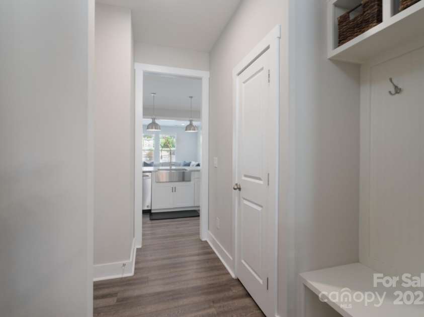 1180 Weir Court, Fort Mill, SC 29708.  MLS# CAR4173538, YatesRealty ID 1007. Hallway from Kitchen to Dining Room