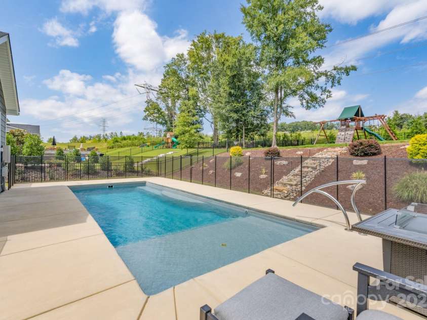 1180 Weir Court, Fort Mill, SC 29708.  MLS# CAR4173538, YatesRealty ID 1007. Heated Salt Water Pool
