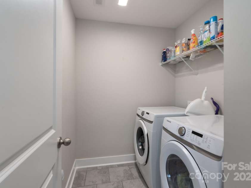 1180 Weir Court, Fort Mill, SC 29708.  MLS# CAR4173538, YatesRealty ID 1007. Upper Level Laundry Room