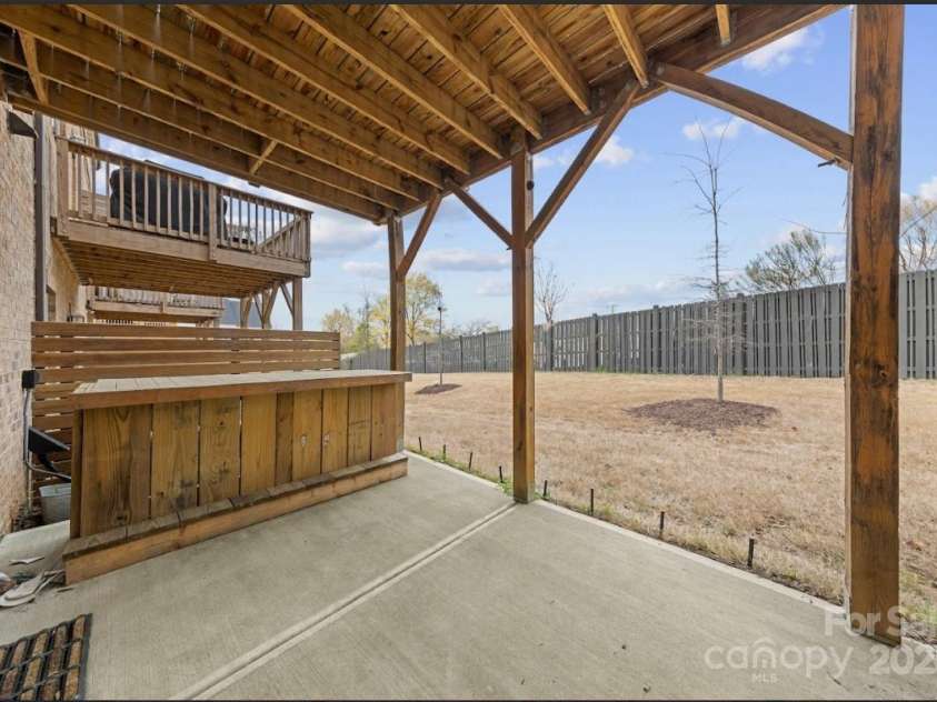 11039 Stetler Street, Charlotte, NC 28204.  MLS# CAR4244228, YatesRealty ID 10070. Lower level walk out patio