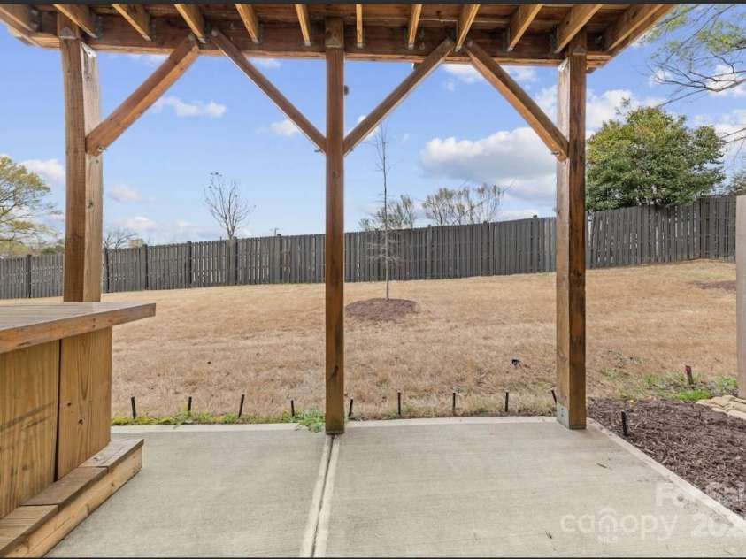 11039 Stetler Street, Charlotte, NC 28204.  MLS# CAR4244228, YatesRealty ID 10070. Lower level walk out patio