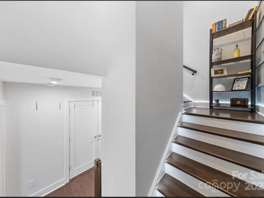 11039 Stetler Street, Charlotte, NC 28204.  MLS# CAR4244228, YatesRealty ID 10070. Stairs to top floor