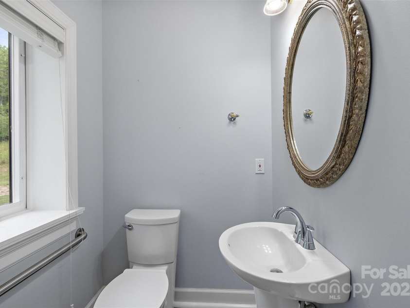 361 Osprey Place, West Jefferson, NC 28694.  MLS# CAR4237060, YatesRealty ID 10071. Main Level Half Bath
