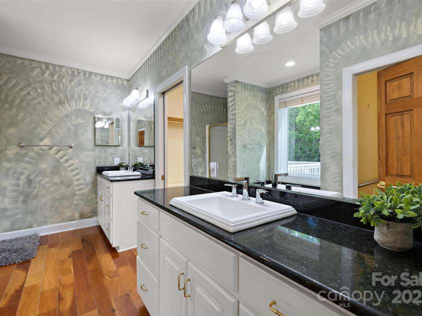361 Osprey Place, West Jefferson, NC 28694.  MLS# CAR4237060, YatesRealty ID 10071. Main Level Primary Ensuite Bathroom with walk-in closet