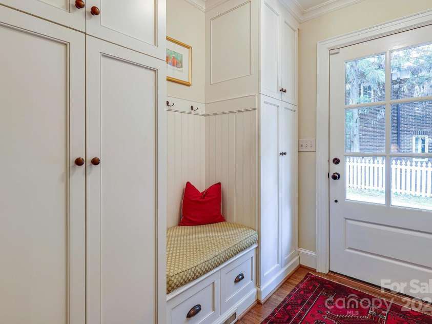 1943 Wendover Road, Charlotte, NC 28211.  MLS# CAR4247717, YatesRealty ID 10072. Drop zone off side entrance, also double door coat closet across from these built ins