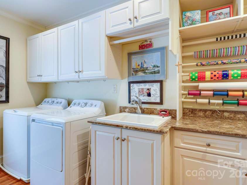 1943 Wendover Road, Charlotte, NC 28211.  MLS# CAR4247717, YatesRealty ID 10072. Great storage in Laundry room