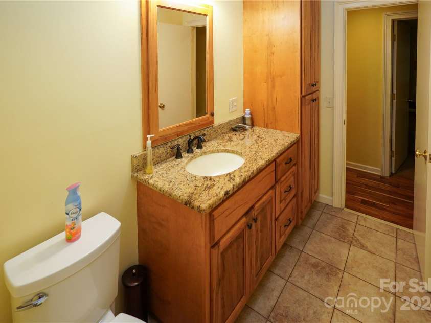 44097 Nc 740 Highway, New London, NC 28127.  MLS# CAR4161324, YatesRealty ID 10075. Hall bath