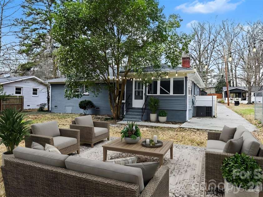 5448 Kinsale Lane, Charlotte, NC 28215.  MLS# CAR4338545, YatesRealty ID 10083. Backyard (virtually staged).