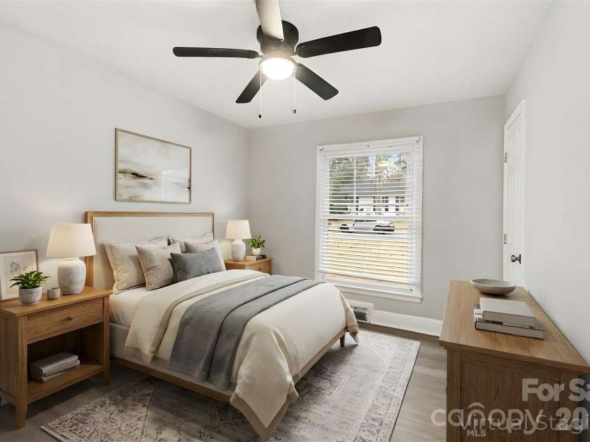 5448 Kinsale Lane, Charlotte, NC 28215.  MLS# CAR4338545, YatesRealty ID 10083. Walking into the second bedroom (virtually staged).