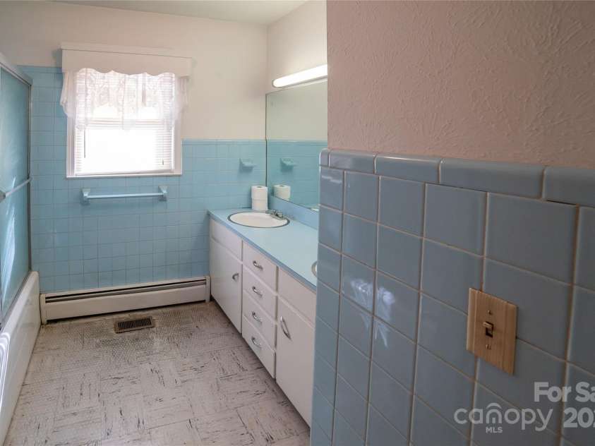 1052 Orchard Street, Valdese, NC 28690.  MLS# CAR4223155, YatesRealty ID 10087. Flooring needs replacing