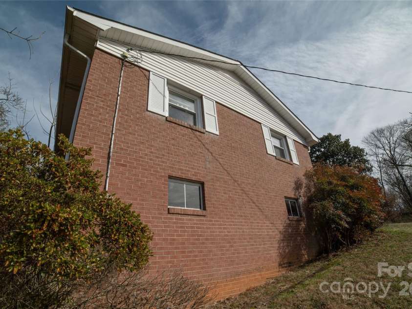 1052 Orchard Street, Valdese, NC 28690.  MLS# CAR4223155, YatesRealty ID 10087. Left wall view