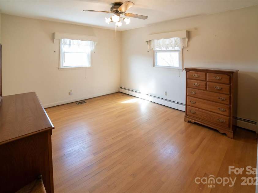 1052 Orchard Street, Valdese, NC 28690.  MLS# CAR4223155, YatesRealty ID 10087. Under the carpet...hardwoods