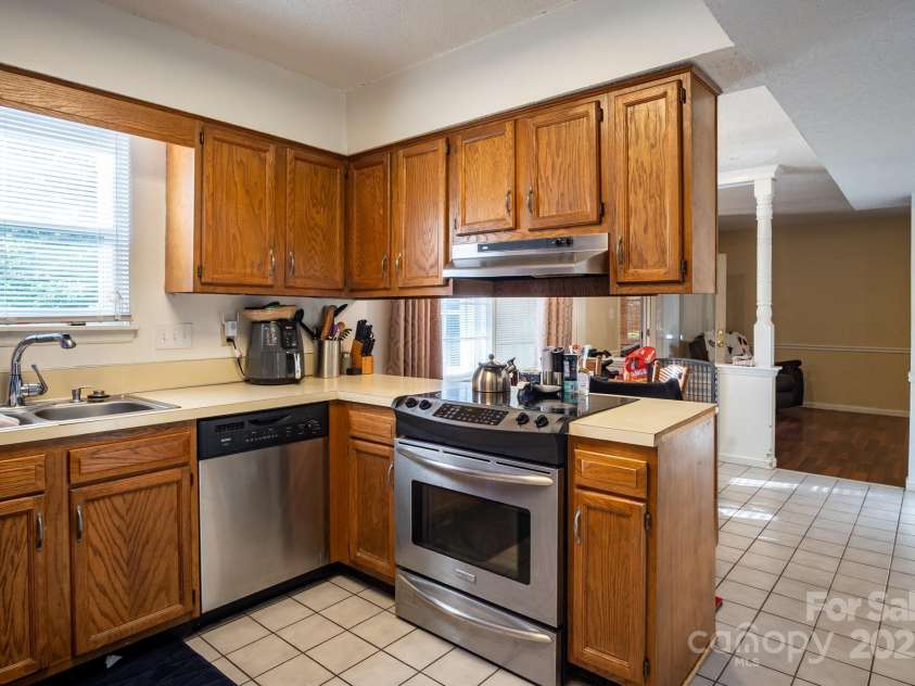 9801 Kent Village Drive, Charlotte, NC 28269.  MLS# CAR4252245, YatesRealty ID 10090. 