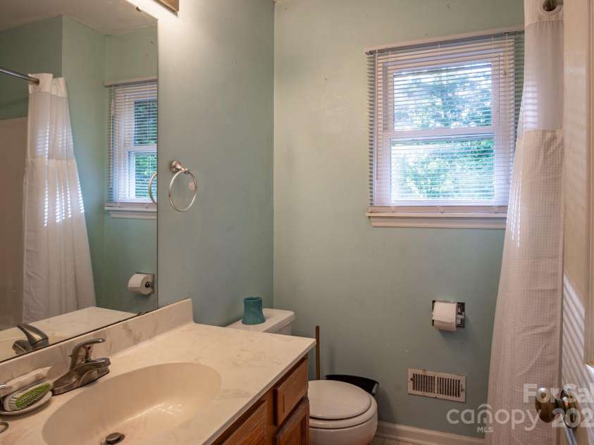 9801 Kent Village Drive, Charlotte, NC 28269.  MLS# CAR4252245, YatesRealty ID 10090. Full secondary bath upstairs
