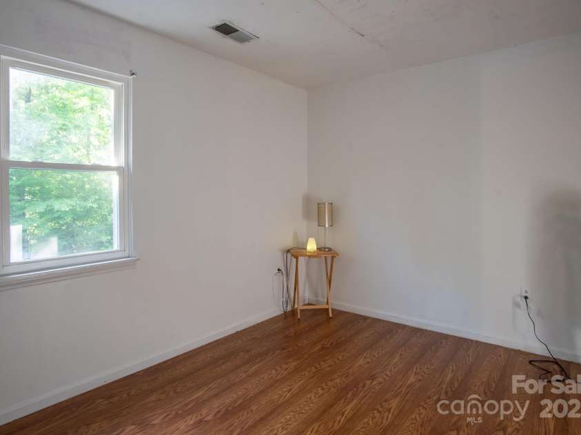 9801 Kent Village Drive, Charlotte, NC 28269.  MLS# CAR4252245, YatesRealty ID 10090. Secondary upstairs bedroom