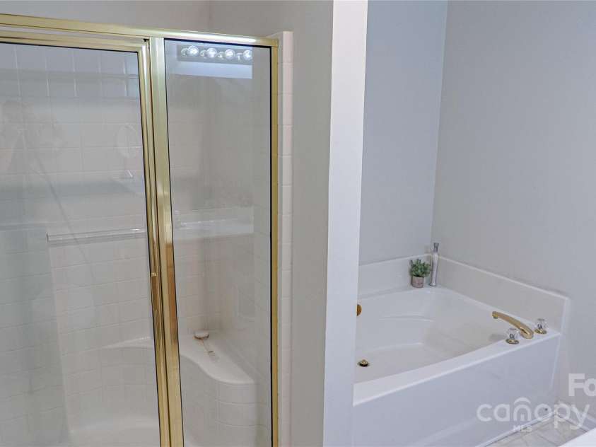 6222 Meadow Glen Lane, Harrisburg, NC 28075.  MLS# CAR4244827, YatesRealty ID 10095. Primary Bathroom