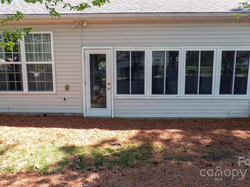 6222 Meadow Glen Lane, Harrisburg, NC 28075.  MLS# CAR4244827, YatesRealty ID 10095. Rear
