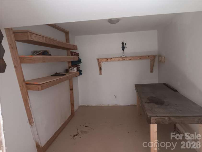 8443 Shiredale Lane, Charlotte, NC 28212.  MLS# CAR4331657, YatesRealty ID 10096. Basement Work Space