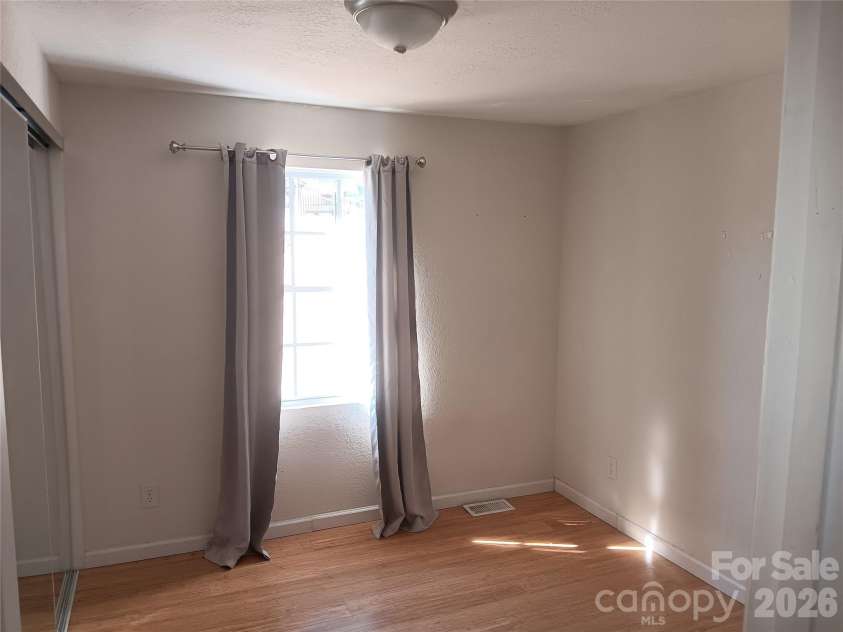 8443 Shiredale Lane, Charlotte, NC 28212.  MLS# CAR4331657, YatesRealty ID 10096. Bedroom 1