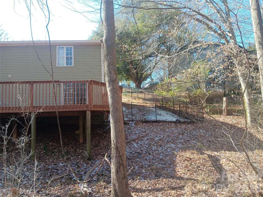 8443 Shiredale Lane, Charlotte, NC 28212.  MLS# CAR4331657, YatesRealty ID 10096. Rear View with Side Yard fenced