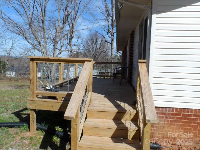 205 Phillips Street, Morganton, NC 28655.  MLS# CAR4201900, YatesRealty ID 10104. Side view of back deck