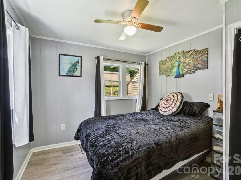 19 Lockman Road, Maggie Valley, NC 28751.  MLS# CAR4270927, YatesRealty ID 10105. Master Bedroom