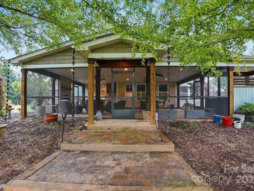 4506 Potter Road, Monroe, NC 28112.  MLS# CAR4251140, YatesRealty ID 10105. Entrance to the screened terrace from the backyard
