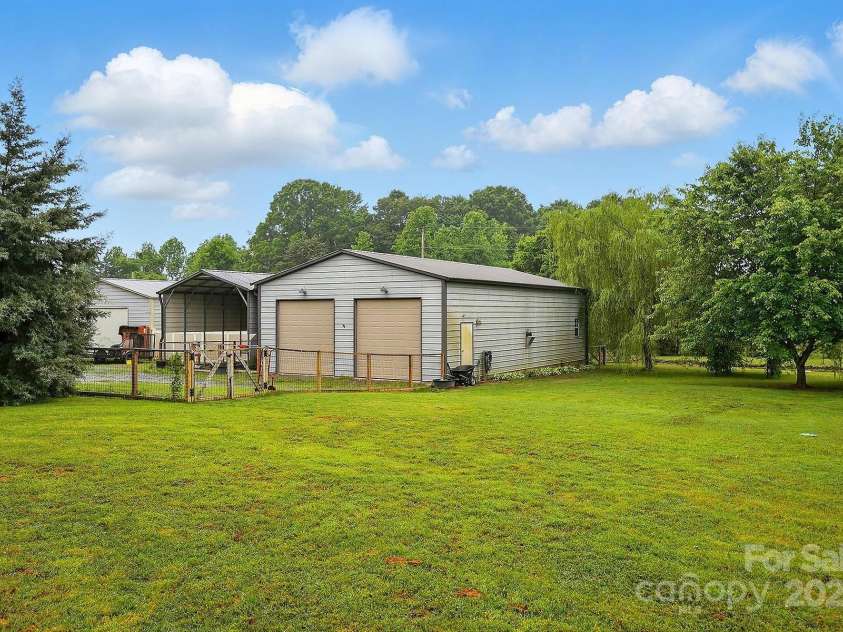 4506 Potter Road, Monroe, NC 28112.  MLS# CAR4251140, YatesRealty ID 10105. Shop/Building with RV shelter