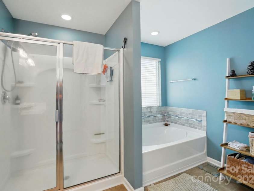 4506 Potter Road, Monroe, NC 28112.  MLS# CAR4251140, YatesRealty ID 10105. Shower and soaking tub