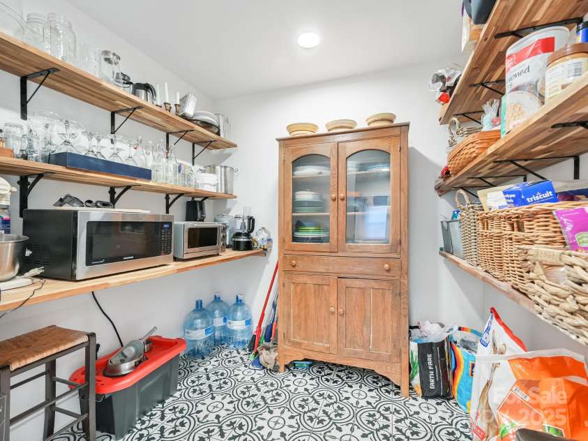3855 Peniel Road, Tryon, NC 28782.  MLS# CAR4238952, YatesRealty ID 10106. Pantry