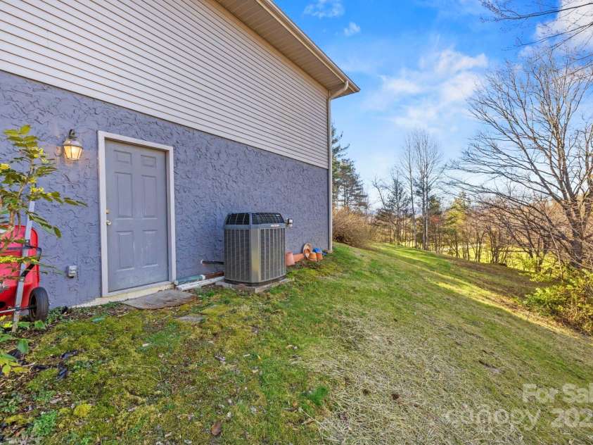 30 Hubbard Circle, Penrose, NC 28766.  MLS# CAR4231452, YatesRealty ID 10112. Basement Entrance