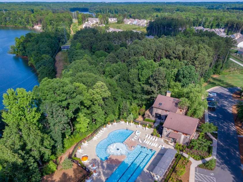 529 Cellini Place, Mount Holly, NC 28120.  MLS# CAR4246421, YatesRealty ID 10114. Community pool w lake view