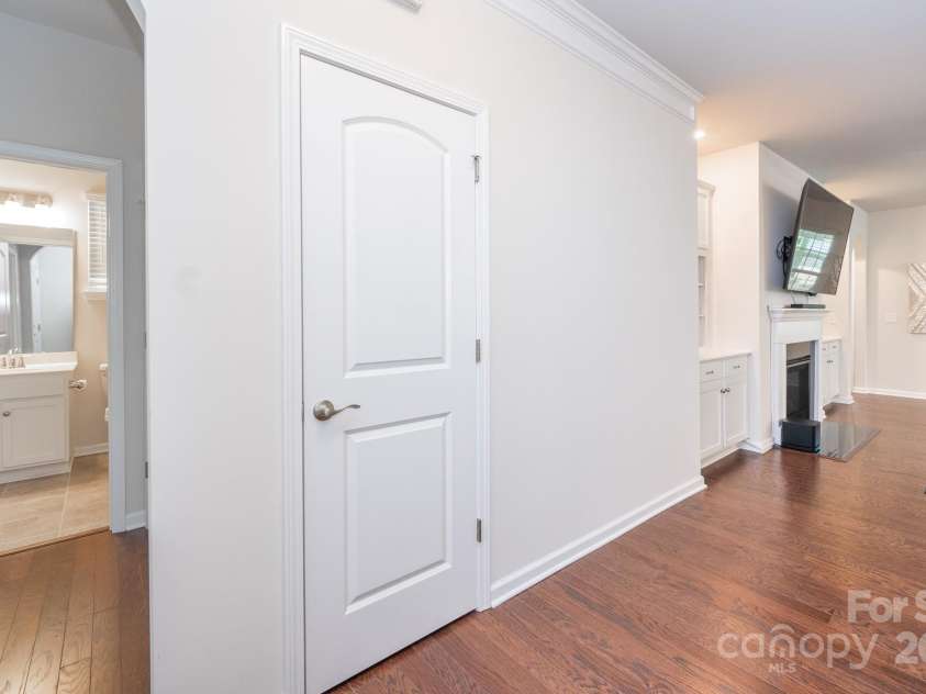 529 Cellini Place, Mount Holly, NC 28120.  MLS# CAR4246421, YatesRealty ID 10114. Entry hall to guest bath and great room