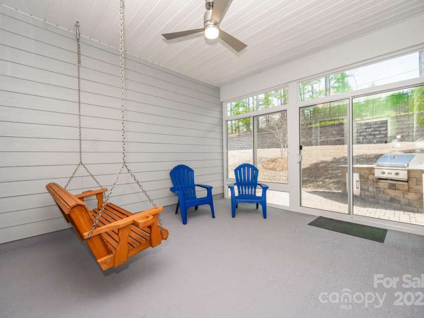 529 Cellini Place, Mount Holly, NC 28120.  MLS# CAR4246421, YatesRealty ID 10114. Glass enclosed patio w epoxy floor