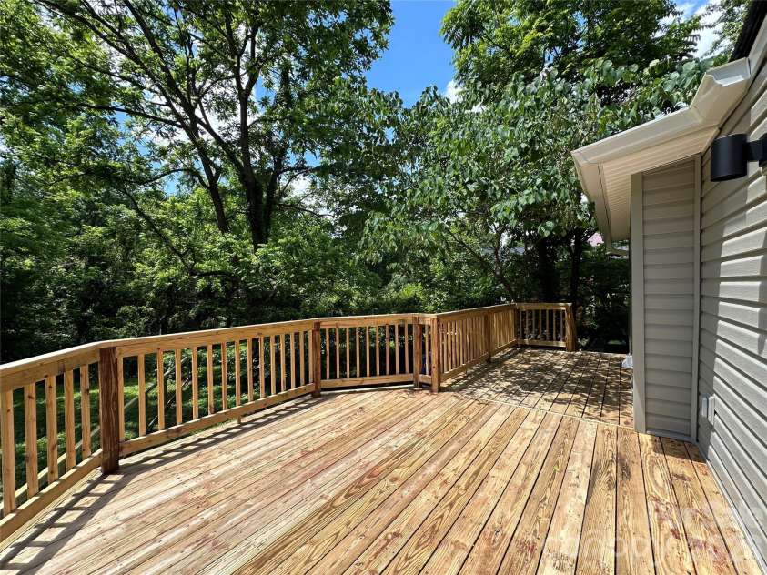123 State Street, Asheville, NC 28806.  MLS# CAR4350606, YatesRealty ID 10115. Back deck from kit